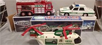 Hess, Patrol Car, Helicopter, Fire Truck.