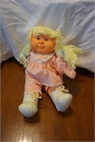 Doll with Pigtails and Pink Dress