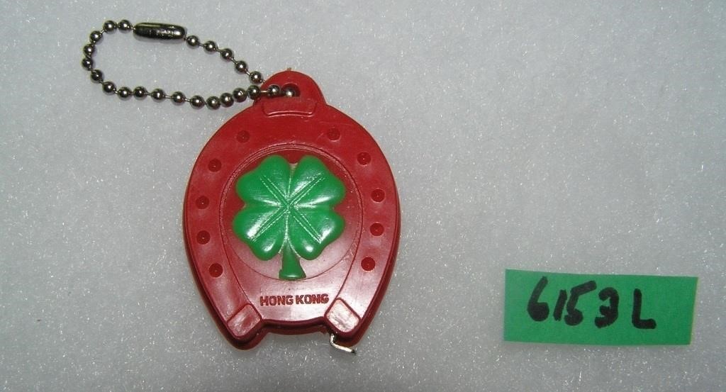 Horse shoe and shamrock Good Luck advertising key