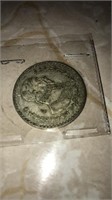 Old Mexican silver dollar