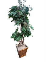 A Faux Tree In Wood Planter.