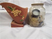 Vintage Glass Jar with an assortment of can lids