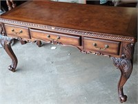 Reproduction Chippendale desk with ornate carved