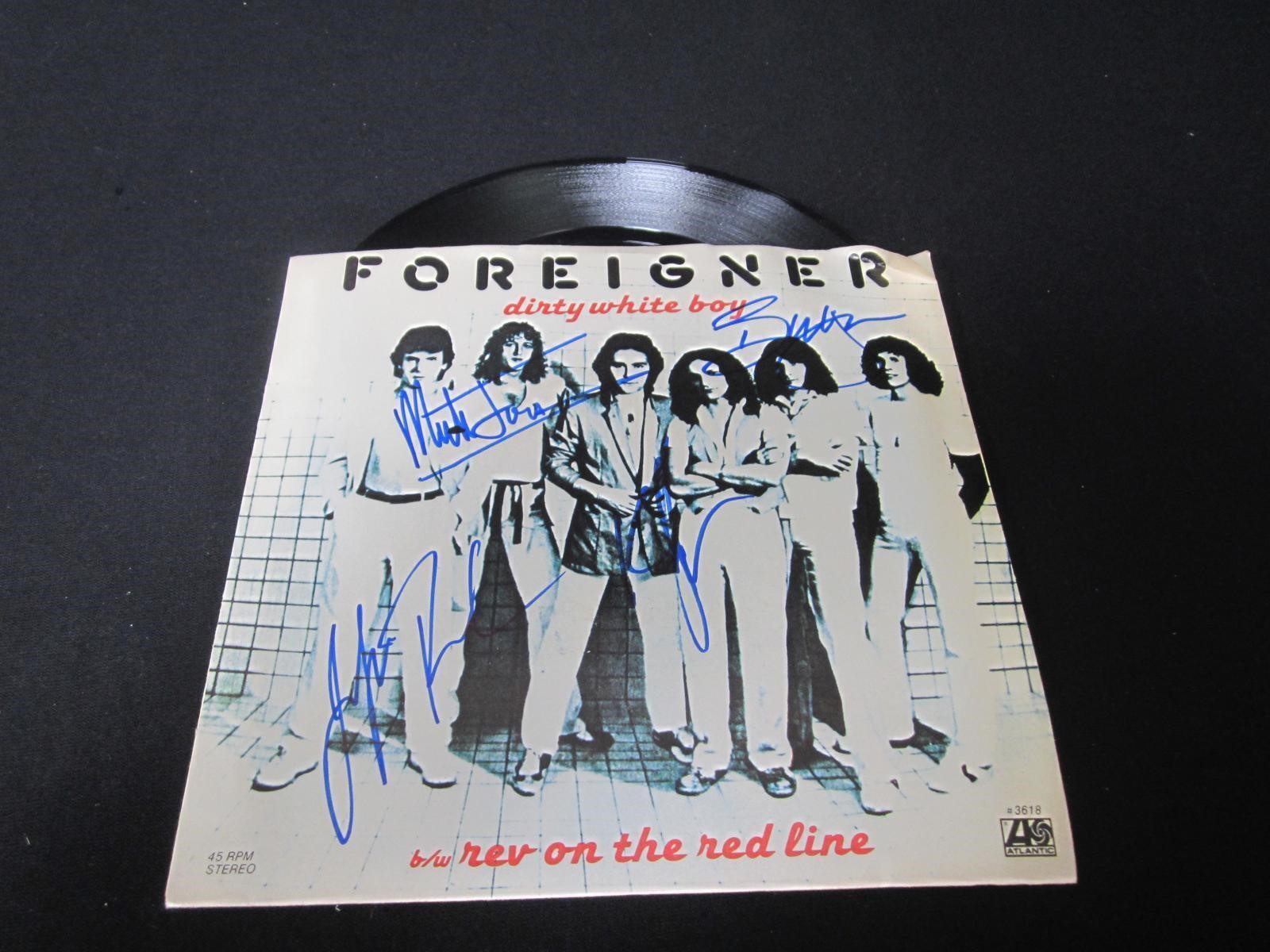 Foreigner Signed Album Heritage COA