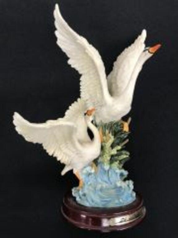 Louis Dionne Swans Taking Flight Statue