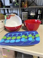 Various plastic bowls and plates
