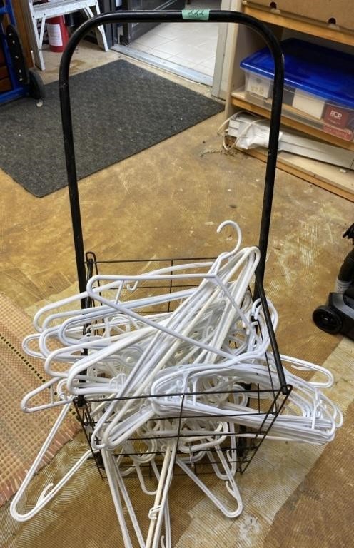 Wire cart full of plastic hangers