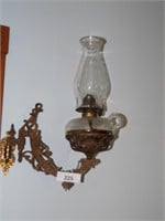 Cole Oil Finger Lamp on wall mount as pictured
