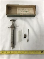Antique Ideal syringe.