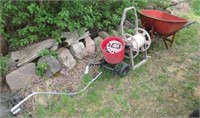 Metal wheelbarrow, Suncast hose reel and Earthway