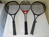 3 tennis rackets (2 Wilson, 1 AMF)