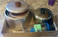 Copper pots, saucepan and water bottle