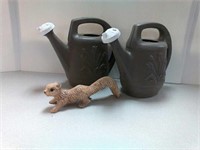 2 plastic garden watering cans & ceramic squirrel