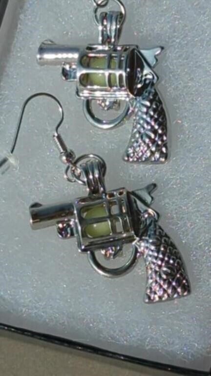 New illuminating revolver earrings. Dangle with