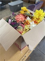 Box of fake flowers
