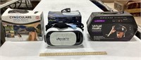 3 virtual reality headsets, all appear new, 1