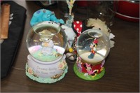 lot of snowglobes, precious moments. mickey.. et.