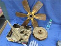 old rusty iron fan blade & other old rusty pieces