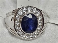 RING MARKED 925 SILVER BLUE STONE WITH SMALL