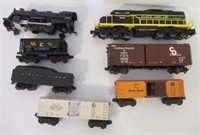 Lot of Lionel train cars that includes coal