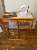 Small wooden shelf and sewing machine