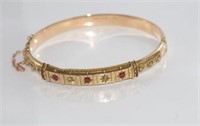 Antique 9ct gold, ruby and diamond hinged bracelet