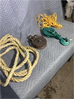 A cable pulley, a cast & wood rope pulley ,