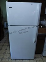 Kenmore refrigerator plugged in and working see
