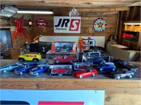 Collection of cast iron cars and trucks