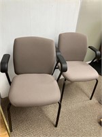 2 metal cushion office chairs.