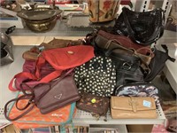 Assorted handbags and fashion purses.