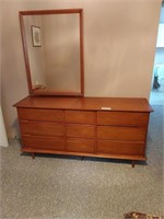 Nine drawer wood dresser