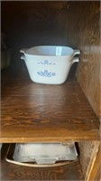 LEFT CUPBORD-CORNINGWARE AND PYREX DISHES