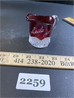 Small Red and clear Pitcher with Leila on it
