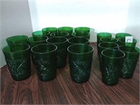 Group of forest green tumblers and juice glasses