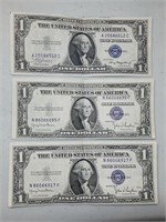 OF) Three 1935 $1 silver certificates