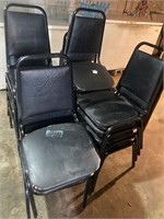 lot of 16 black stack chairs