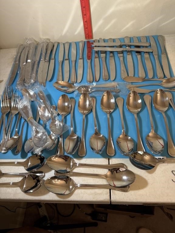 Cuisinart flatware. Sold as shown. Three forks.