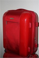 Red hardshell Pacific coast luggage bag