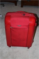 Red hardshell Pacific coast luggage bag