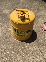 Vintage yellow metal gas can