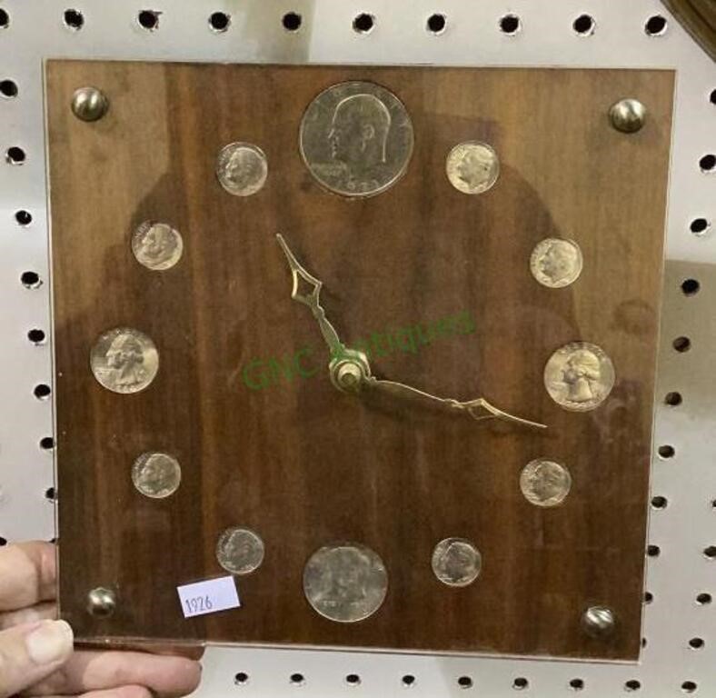 Battery operated wall hanging clock with US coin