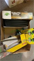 Box of gardening supplies. Includes new Element