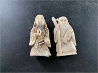 Pair of netsuke figurines, 1 has very detailed rob