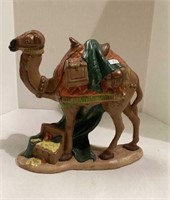 Vintage hand painted ceramic camels measuring 11