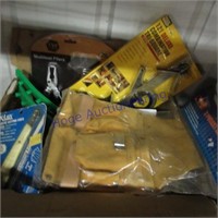 Assorted tools, many in packages