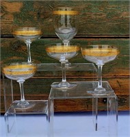 FIVE GOLD RIMMED GLASSES