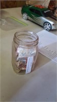 OLD MASON JAR WITH STAMPS