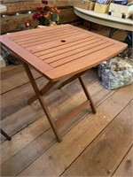 wooden umbrella table