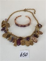 GOLD TONE NECKLACE WITH PURPLE DROPS AND COINS
